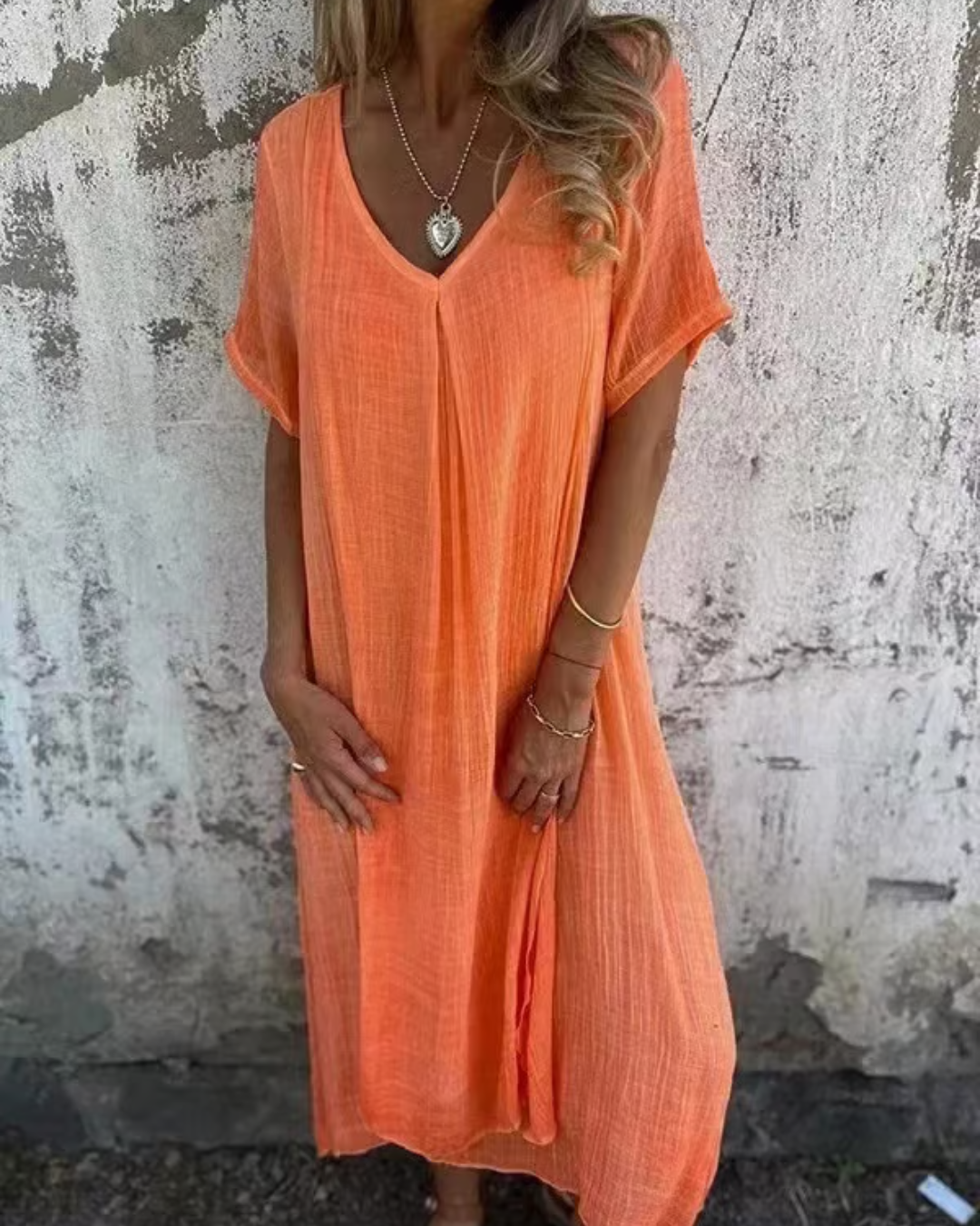 Vestido midi de algodón y lino con escote en V®