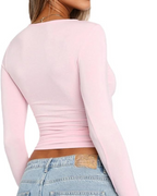 Camiseta corta ceñida de manga larga para mujer